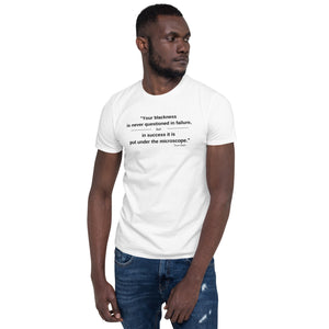 "Your Blackness is never questioned in failure, but in success it is put under the microscope." - Trevor Noah Quote - Unisex White T-shirt
